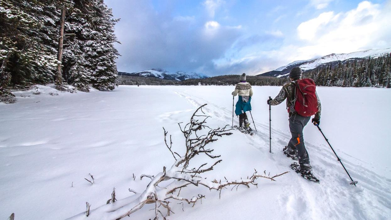 Snowshoeing on a frozen Maligne Lake