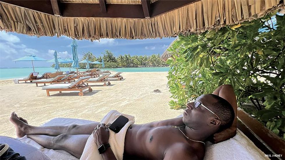 The author\u2019s husband, Lance, relaxing beachside