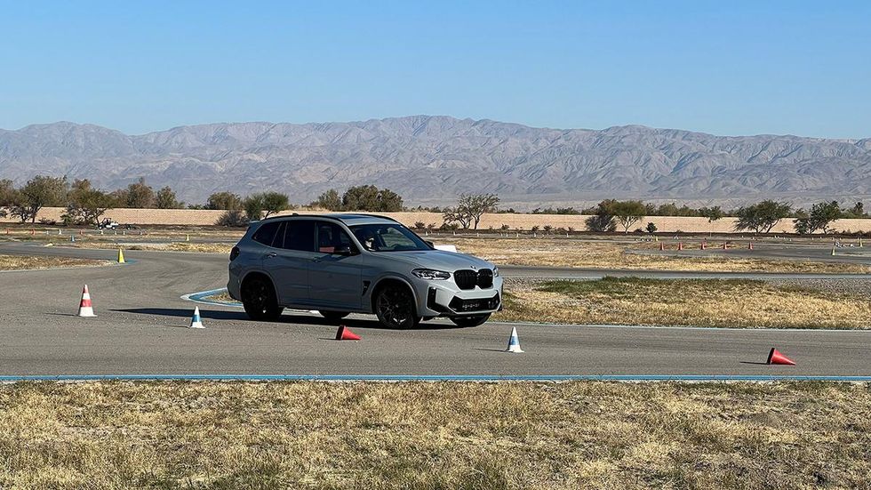 The author\u2019s son at the BMW Performance Center showing how not to drive dad\u2019s car