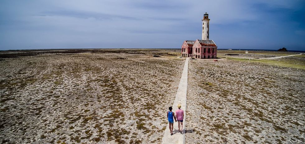 The iconic Klein Cura\u00e7ao Lighthouse sits on a small uninhabited desert island in Cura\u00e7ao.