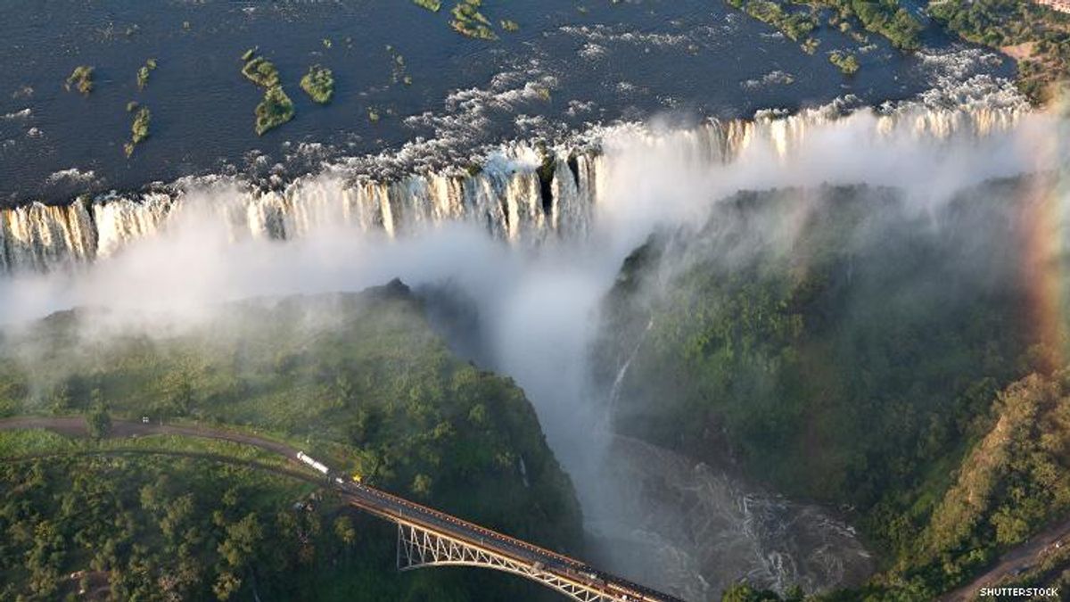 Victoria Falls seen from above with road bridge