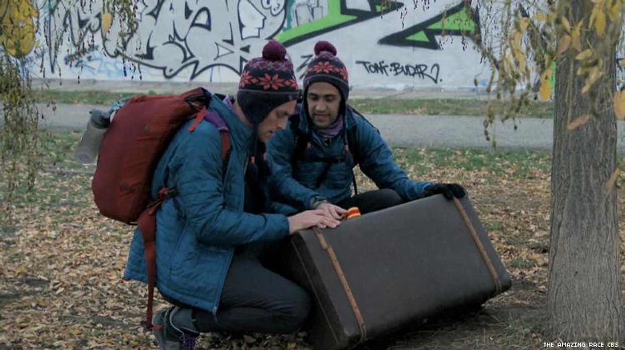 Will and James of 32nd The Amazing Race by the Berlin Wall