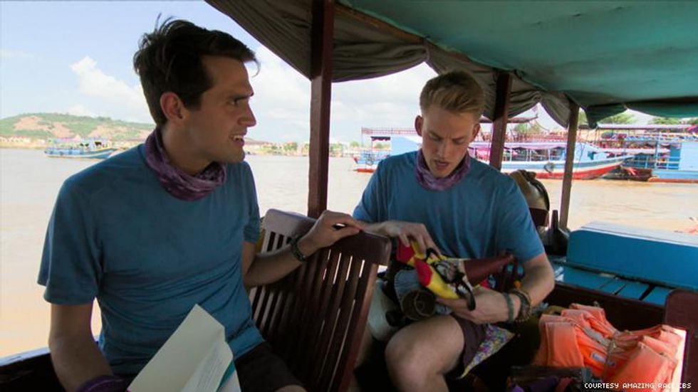 Will and James of 32nd The Amazing Race on a boat with the Roaming Gnome