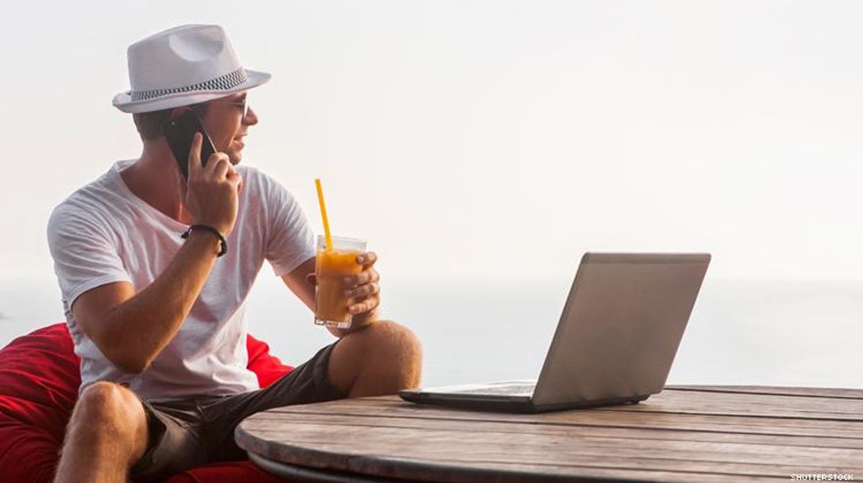 Workation Man working at beach