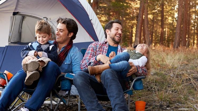 Dads with two kids camping 