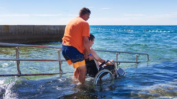 ramp allows wheelchair user to enter water at beach 