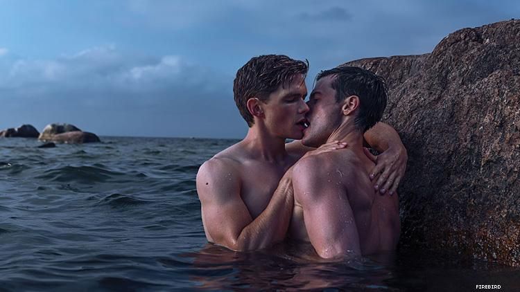 Firebird still two men kissing in water