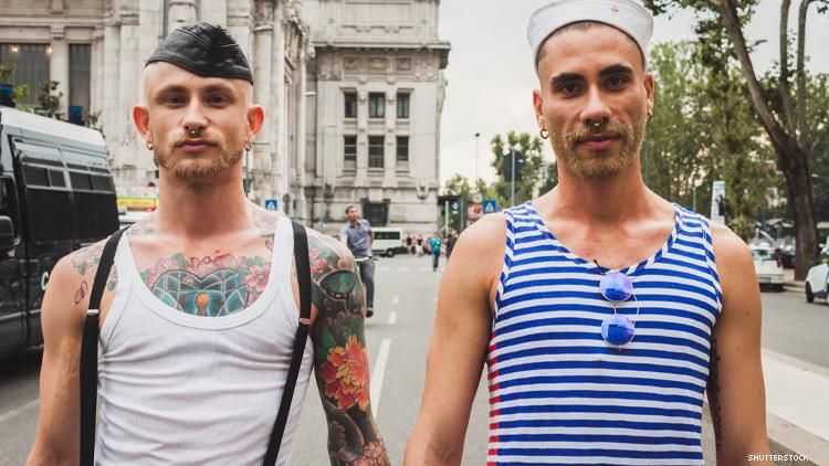 gay couple holding hands in milan Itally