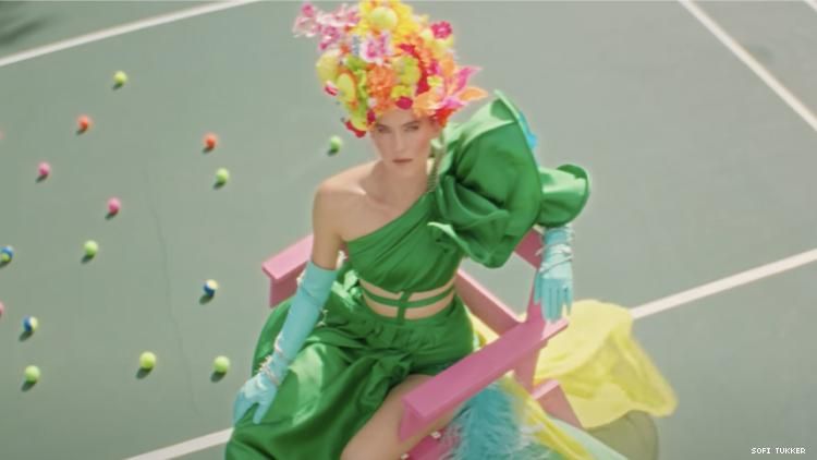 Sofi wearing headdress of tennis balls