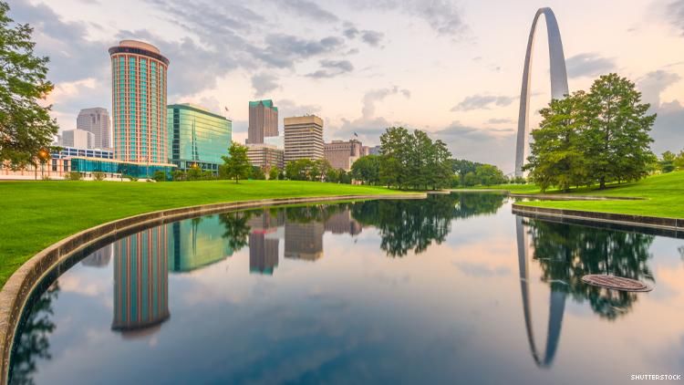 St Louis skyline and arch reflected in pond