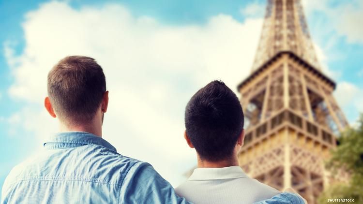 Gay couple in front of eiffel tower in france