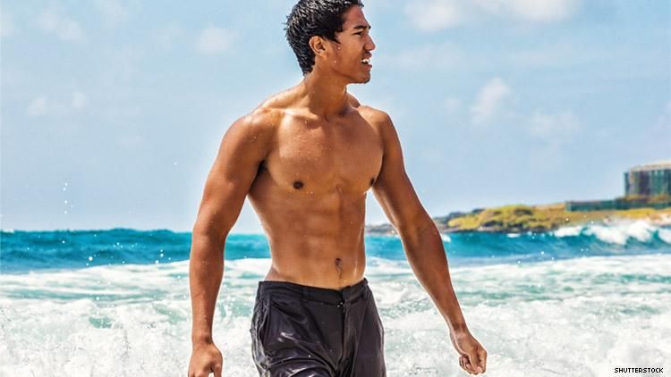 Asian man on Hawaiian beach