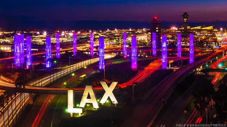 Police Investigating as Four People Fall Ill at LAX Airport -- One person remains in critical condition.