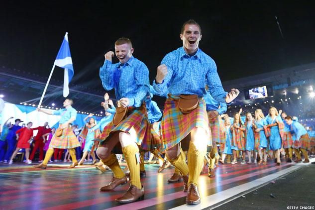 PHOTOS: Barrowman Frenches Guy as Commonwealth Games Begin in Scotland