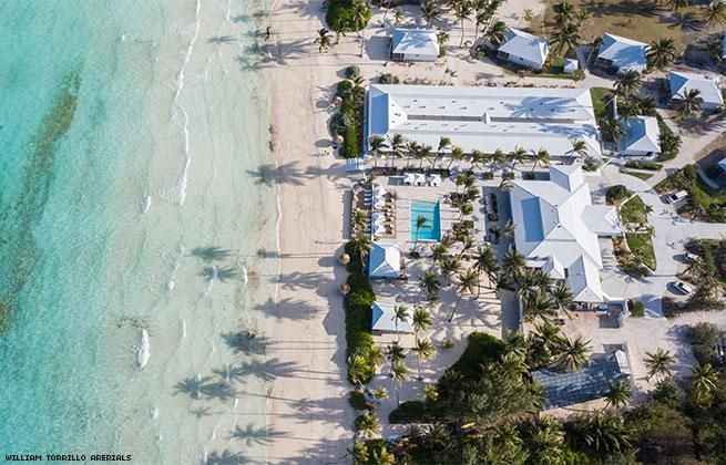 A beachfront hotel on a Bahama island from above