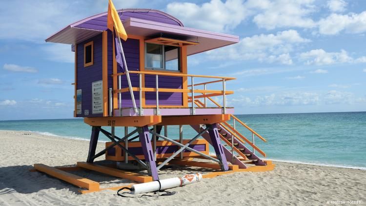 A purple and orange lifeguard tower