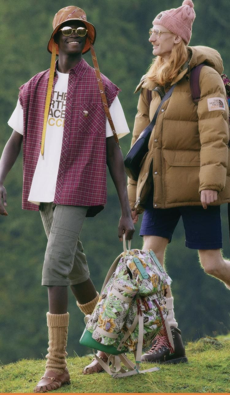 two men, one Black hike in North Face x Gucci outfits