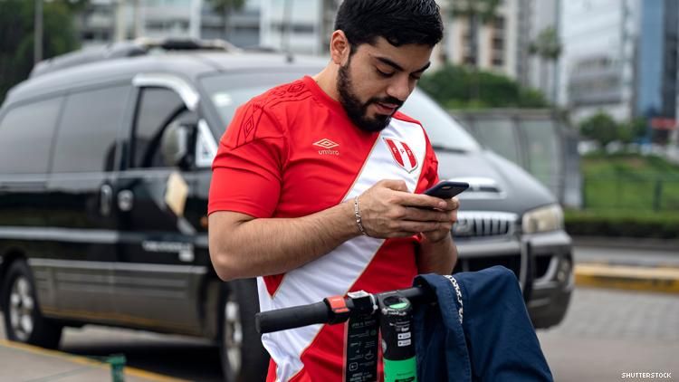 Peru man on smart phone