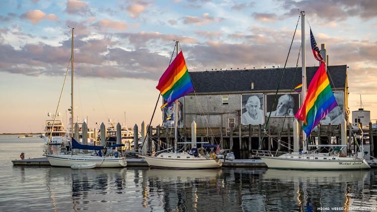 Provincetown harbor with boats and rainbow flags