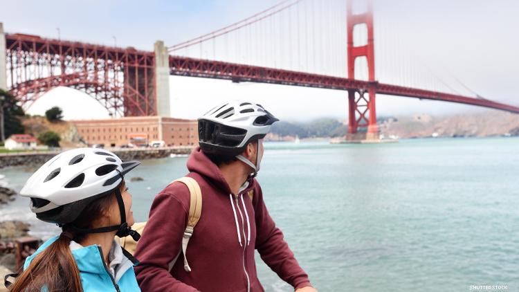 bike riders looking at Golden Gate Bridge in San Francisco